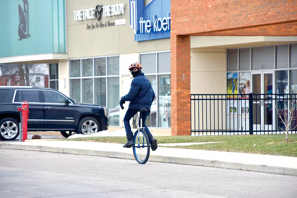 "It's the only way I get around, whether it's raining, snowing or a tornado siren is going off," Austin says. - DOYLE MURPHY