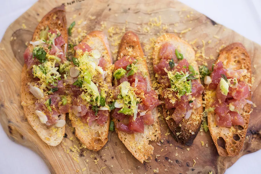 The tonno crudo bruschetta, topped with cubes of tuna is like a southern Italian riff on poke. - MABEL SUEN