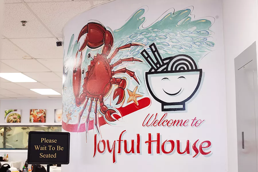 There have been a few attempts to bring character to the space, including a sea-themed mural of a fish, crab and bowl of noodles at the front door. - MABEL SUEN