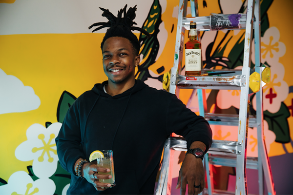 St. Louis Muralist Javyn Solomon @jayvnize / PHOTO CREDIT: Tristan Oliver @topshottah