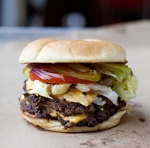 JENNIFER SILVERBERG - Rain Crow Ranch of Gape Girardeau is the source of the grass-fed beef in this double cheeseburger with lettuce, tomato, red onion and pickles. Slideshow: Inside Sugarfire Smoke House.