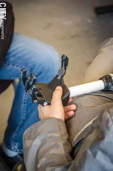 A 3D printed hand can be made for less than $50 in materials at RIT's MAGIC Center. - PHOTO BY MARK CHAMBERLIN