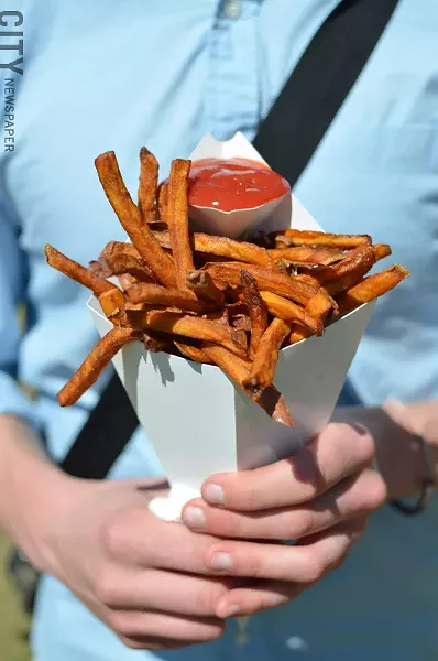 A cone of sweet potato fries. - PHOTO BY MATT DETURCK