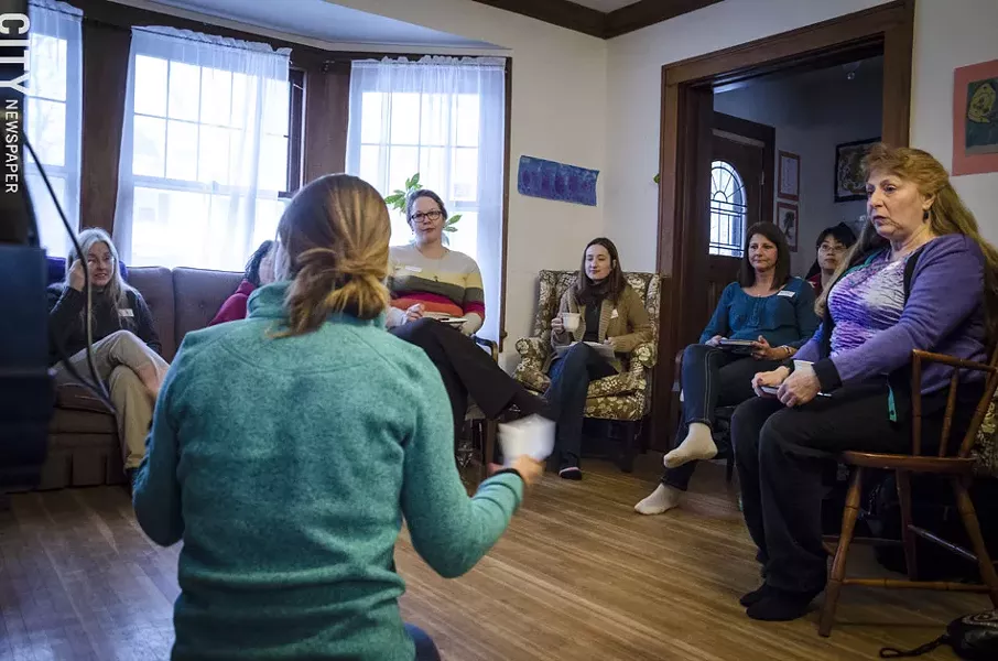 A Mothers Out Front house party, held on Saturday. The gathering brought together a handful of mothers and grandmothers, who talked about climate change and what they could do to urge state elected officials to act on it - PHOTO BY MARK CHAMBERLIN