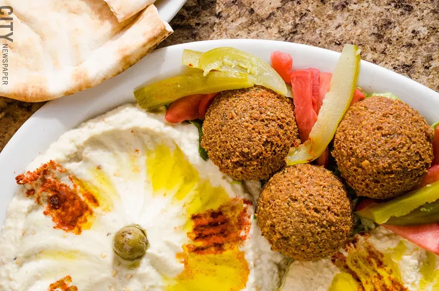 A vegetarian combo platter from Sultan Lebanese Restaurant & Bakery. - PHOTO BY MARK CHAMBERLIN