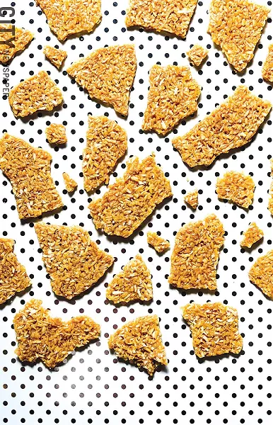 Better Brittle's coconut brittle is easy on the teeth and offers a crispy, crunchy texture. - PHOTO BY MARK CHAMBERLIN
