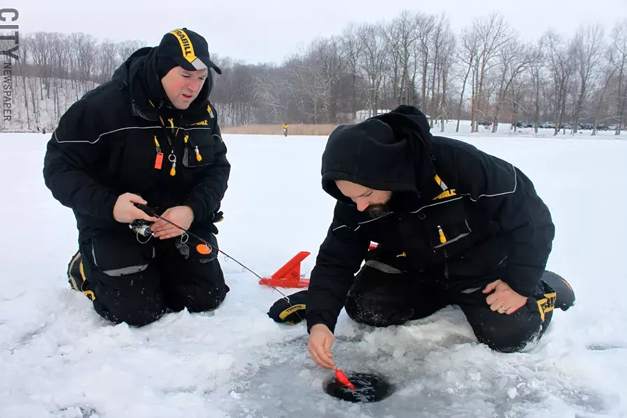 Brothers Jeff and Tim Thomas (left to right) fish at Mendon Ponds Park. - PHOTO BY KATHY LALUK