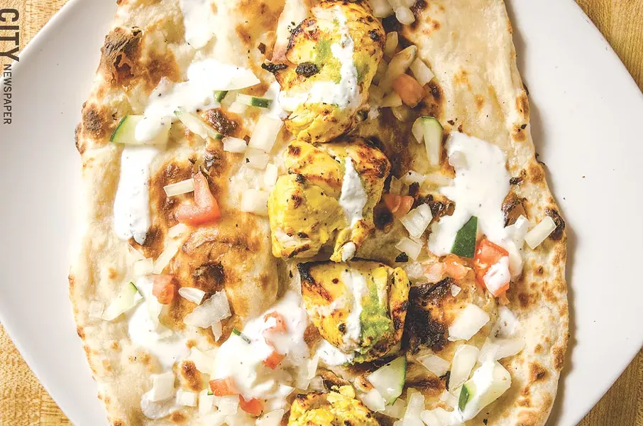 Chicken wrap: naan, chicken, yogurt, onion, cucumber, tomato. - PHOTO BY MARK CHAMBERLIN
