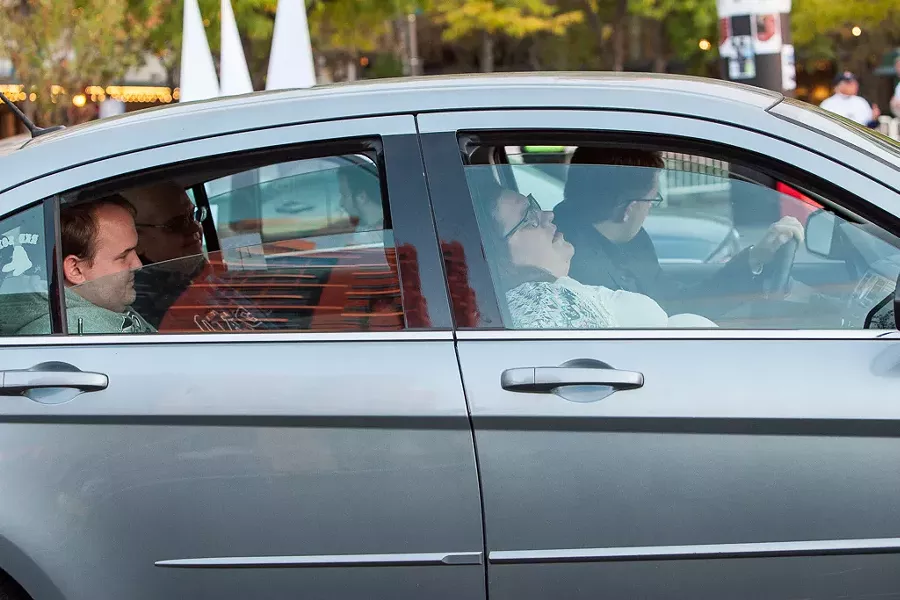 "Dashboard Dramas" performs inside of cars parked in the Spiegelgarden. - PHOTO BY JOHN SCHLIA