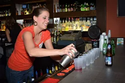 Flower City Habitat Young Professionals activities include fundraisers like the “Raise a Glass” guest-bartender events. - PHOTO PROVIDED
