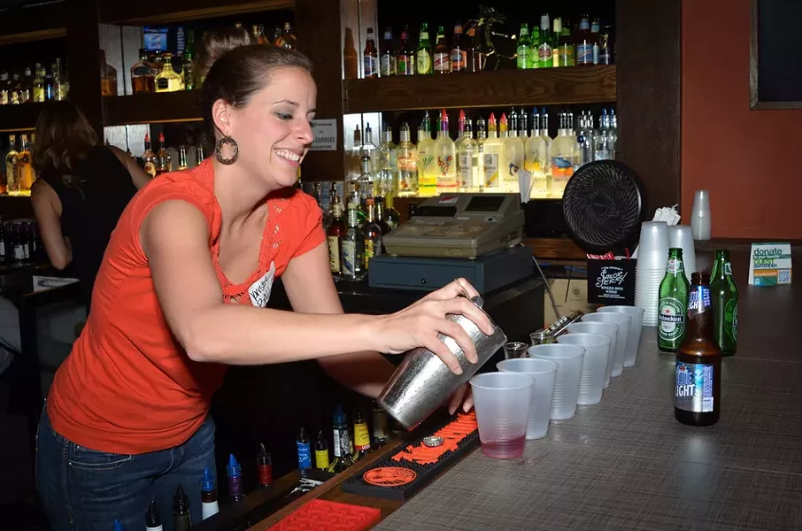 Flower City Habitat Young Professionals activities include fundraisers like the “Raise a Glass” guest-bartender events. - PHOTO PROVIDED