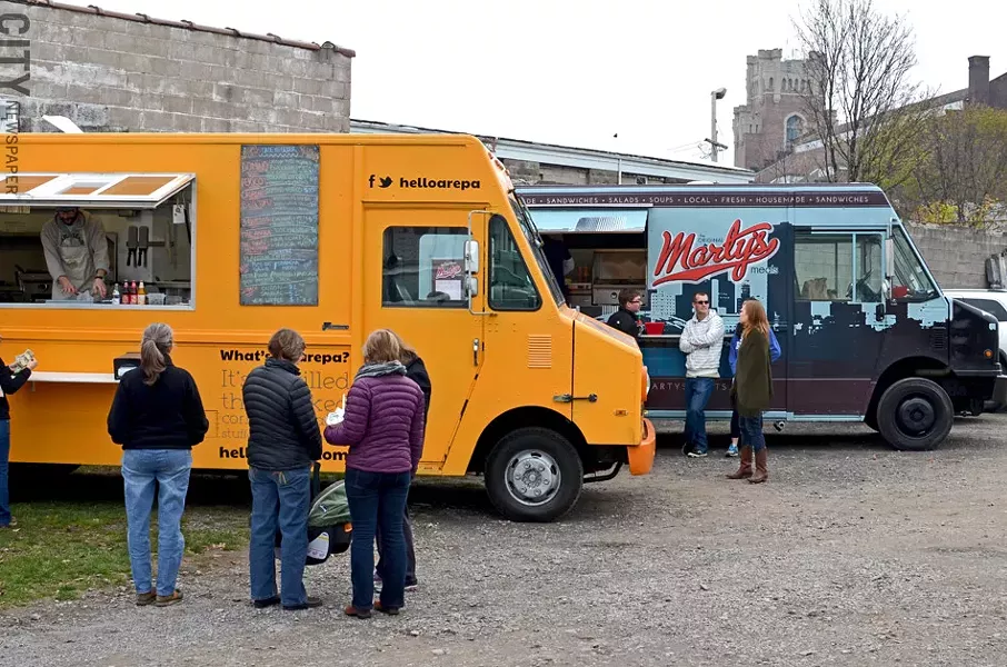 Food trucks like Hello Arepa and Marty’s Meats occasionally set up shop at the Object Maker’s Lot near the Public Market. - PHOTO BY MATT DETURCK