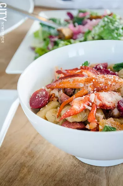 Gnocchi with lobster, roasted golden beets, and fennel butter sauce. - PHOTO BY MARK CHAMBERLIN