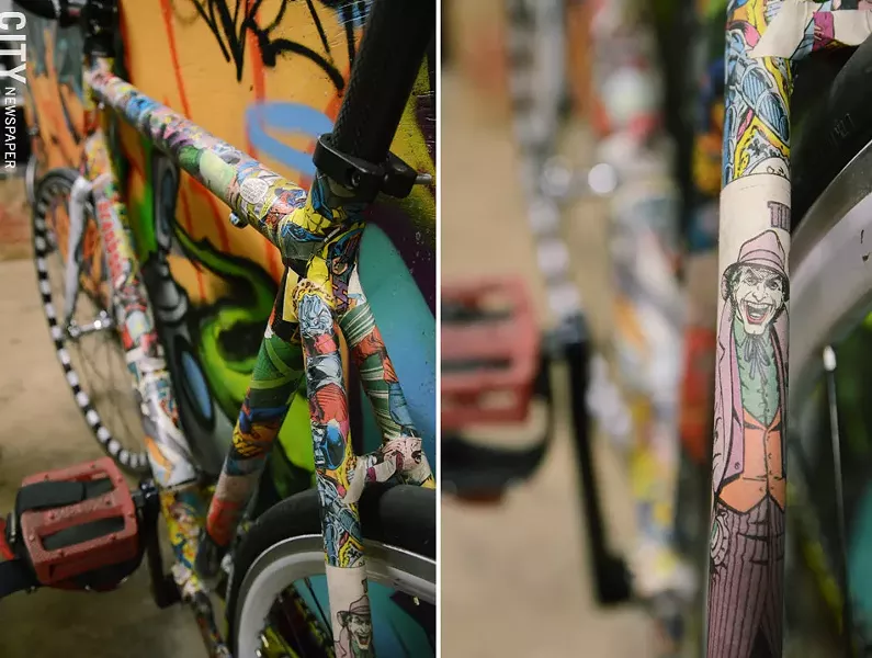 Jarred Foster pasted some of his favorite comic-book characters over the frame of one of his custom-built bikes. - PHOTO BY LARISSA COE