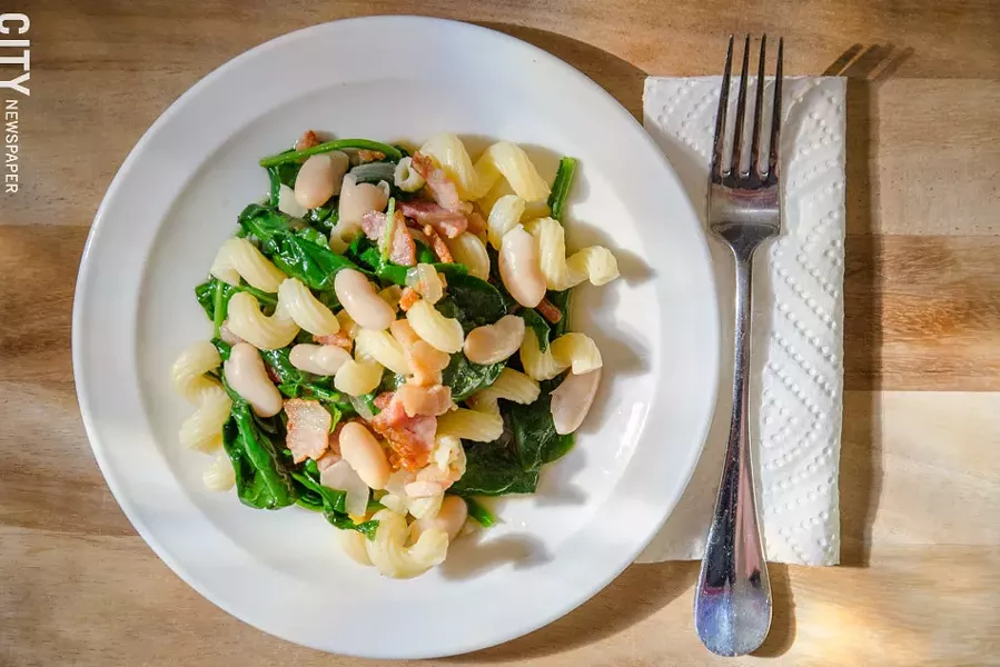 Make a traditional dish like beans and greens more palatable to kids by cutting the ingredients into larger chunks, and putting the liquid into a sippy cup. - PHOTO BY MARK CHAMBERLIN