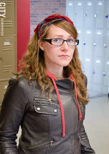 Marci Saunders-Arnett is more than $15,000 in debt after attending two community colleges. - PHOTO BY MARK CHAMBERLIN