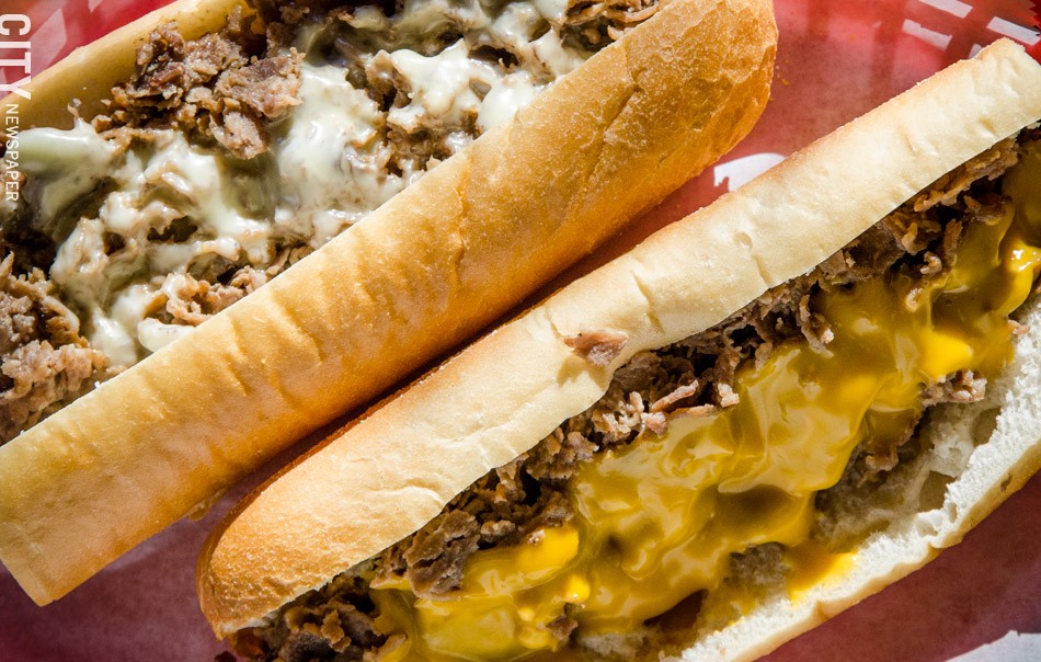 Philly Steak sandwiches on Amoroso rolls with cheese - PHOTO BY MARK CHAMBERLIN