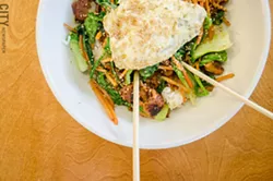 Pork bi bim bap with a fried egg. - PHOTO BY MARK CHAMBERLIN