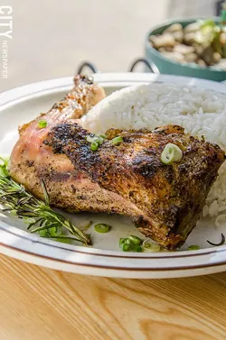 Roast chicken with rosemary, scallions, and rice from La Marifinga.