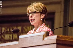 Sue Cotroneo, managing director of Rochester Lyric Opera, announces plans to convert a former East Avenue church into a performance hall. - PHOTO BY MARK CHAMBERLIN
