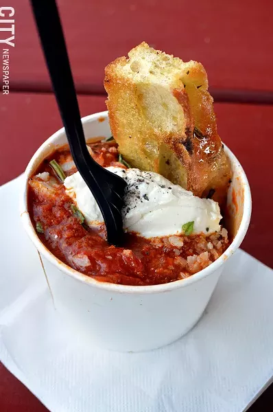 The Meatball Truck Co. meatballs in a cup with bread. - PHOTO BY MATT DETURCK