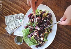 The roasted and marinated red beets — served over mixed greens and topped with an herb vinaigrette, walnuts, and goat cheese — at Mise en Place. - PHOTO BY MATT DETURCK