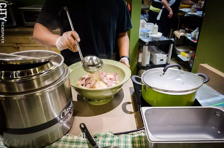 The SOUPer Bowl Challenge involves consuming seven pounds of pho in less than 45 minutes at The Soup Spoon in Victor. - PHOTO BY MARK CHAMBERLIN