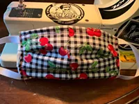 Local fashion designer puts needle and thread to surgical masks