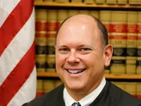 Former Monroe County judge accused of sexual abuse by secretary