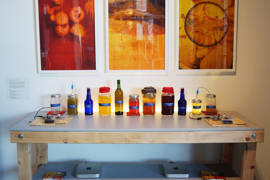 For its OS Fermentation project, EcoArtTech used custom electronics and software that allowed microbes from fermenting foods to take their own "selfies." Through OS Fermentation, the collaborators sought to expose the public to fermentation as an alternative to industrial food preservation processes. Shown is an installation from the curated exhibition FOODshed: Art & Agriculture in Action, which was shown at two galleries in 2014 and 2015. - PHOTO PROVIDED BY ECOARTTECH