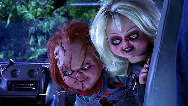 Chucky (voiced by Brad Dourif) and Tiffany (Jennifer Tilly) in "Bride of Chucky." - PHOTO COURTESY UNIVERSAL PICTURES