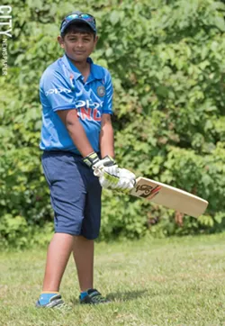 Third-grader Arjun Savudu plays both cricket - and baseball. - PHOTO BY JACOB WALSH