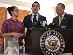 MaryBeth and Adam Gillan, center, with Sen. Charles Schumer advocating for blister packs for opioids. - PHOTO BY DAVID ANDREATTA