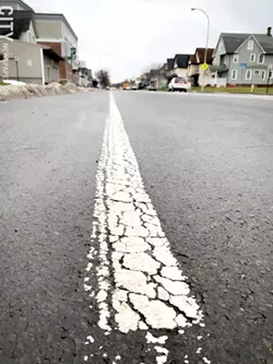 Later this year, the city will begin a $25 million project to resurface East Main Street between North Goodman and Culver. Protected bike lanes will be added as part of the project. - PHOTO BY RYAN WILLIAMSON
