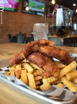 Beer-battered chicken tenders and fries. - PHOTO BY JACOB WALSH