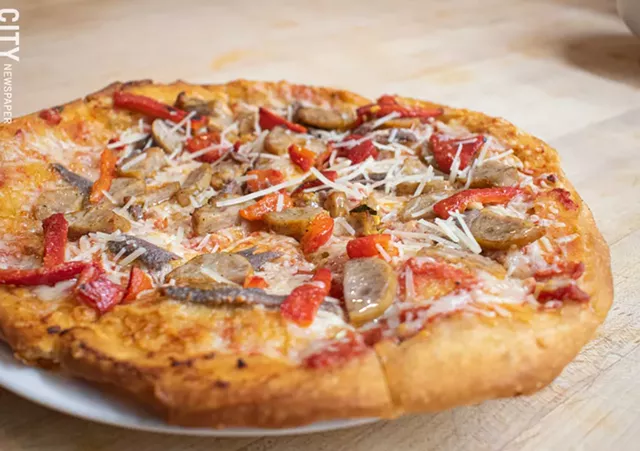 Paulino's specialty, fried pizza. - PHOTO BY JACOB WALSH