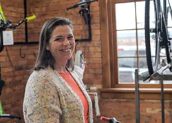 Shana Lydon, general manager at Full Moon Vista, said the shop learned this week that the state will allow it to stay open because it performs bicycle repairs. - PHOTO BY JEREMY MOULE