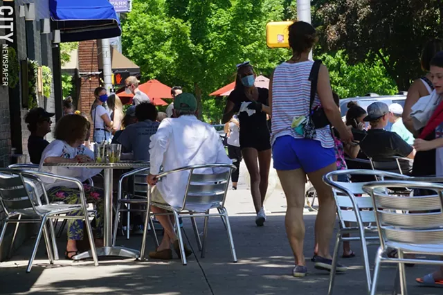 The scene outside Blu Wolf Bistro on June 4, 2020, the first day outdoor restaurant seating was re-introduced. - PHOTO BY GINO FANELLI