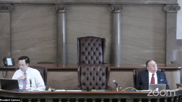 A screen shot of the Monroe County Legislature video meeting. Legislature Clerk Jack Moffitt, left, and President Joe Carbone, right. - SCREEN