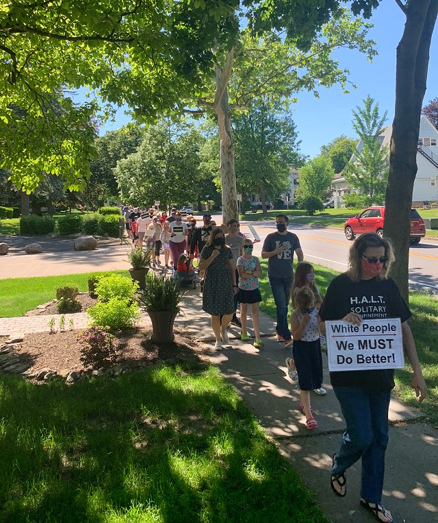 Black Lives Matter organizers held a march in Fairport on Sunday, June 7, which was attended by about 200 people. - PHOTO BY ALEXA GUZMÁN