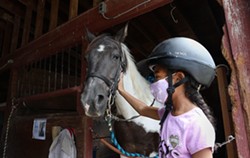 Jayla Rogers, a 9-year-old who lives in Gates attended a one-week camp at A Horse's Friend this summer. "She really enjoyed her time there and has a passion for animals, especially horses," says Jayla's mother, Sara Rogers. - PHOTO CREDIT MAX SCHULTE / WXXI NEWS