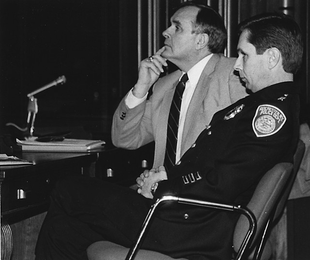 Former RPD Chief Delmar Leach (left) and Deputy Chief Terence Rickard at a City Council hearing on police brutality in December 1985.