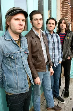 The Low Spirits are (left to right) Ryan Moore, Michael Maier, Richie DeJohn, and Zachary Koch. - PHOTO BY RENÉE HEININGER