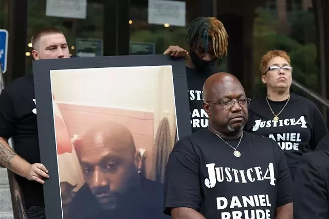 Daniel Prude's brother, Joe Prude, outside City Hall on Wednesday, Sept. 2, 2020, to announce plans to sue the city over Prude's death. - PHOTO BY MAX SCHULTE