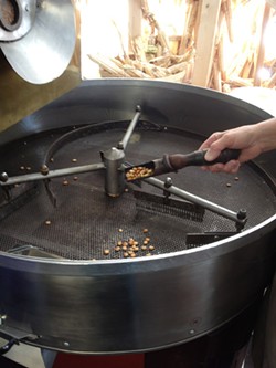 Roasting sorted-out corn kernels to be processed into white corn flour. - PHOTO PROVIDED