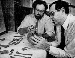 Brian Nagel and Charles Hayes check a skull that had been removed from a burial site in Highland Park in this 1984 Democrat and Chronicle file photo found on Newspapers.com. - NEWSPAPERS.COM