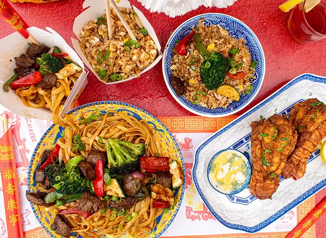 The Saucey Chef's "Netflix & Chill" entrée features steak, garlic noodles, lobster tails, and veggie fried rice. - PHOTO BY JACOB WALSH