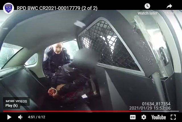 A screen grab from a Rochester Police Department body-worn camera that captured a female officer pepper-spraying a 9-year-old handcuffed girl. Union President Mike Mazzeo defended the actions of the officers in the video, saying that if officers had to use more force the girl might have been hurt.