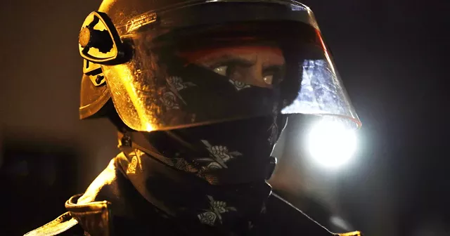 The RPD's Tactical Unit insignia featuring double lightning bolts and the number "8" had some protesters accusing officers of wearing neo-Nazi symbols. - PHOTO BY MAX SCHULTE