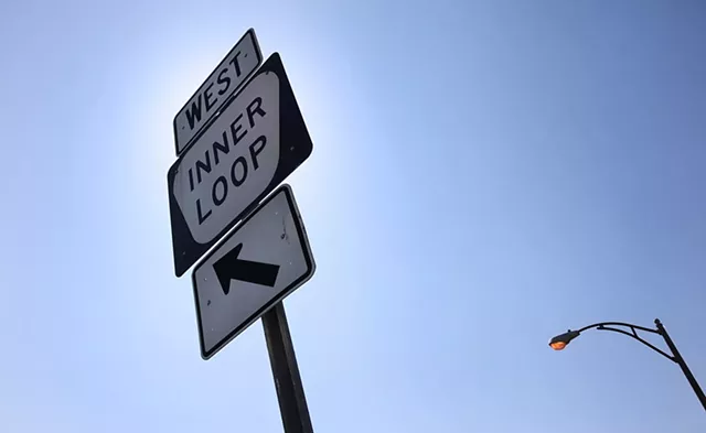 Inner Loop West sign on Scio Street in Rochester. - PHOTO BY MAX SCHULTE